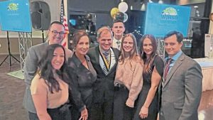 Scott Breisinger, center, poses with family members at the 2025 West Jefferson Hills School District Hall of Fame banquet at Georgetown Centre.