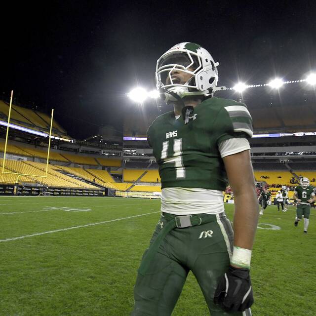 Pine-Richland’s Jay Timmons celebrates after defeating Peters Township in the WPIAL Class 5A championship game on Saturday, Nov. 23, 2024, at Acrisure Stadium.