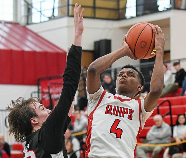 Aliquippa’s Josh Pratt (right) attempts a shot over Westmont Hilltop’s Jack Wesner in a PIAA Class 3A first-round game Saturday, March 8, 2025, at Aliquippa.