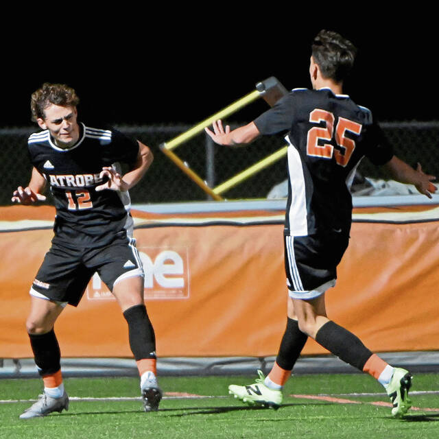 Latrobe’s Roman Agostoni celebrates with Warren Agostoni after scoring the lone goal against Franklin Regional on Tuesday, Oct. 8, 2024.