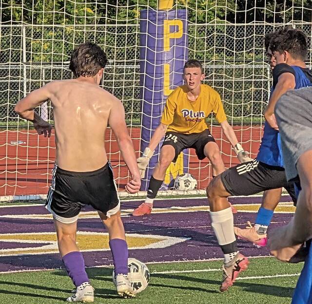 Plum rising junior goalkeeper Chase Eber looks to defend during a voluntary workout session July 23<ins>,</ins><ins> 2025,</ins> at Plum High School.
