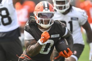 Cleveland Browns rookie running back Quinshon Judkins runs with the ball during minicamp last month.