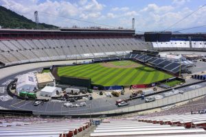 Work continues on the baseball field inside the racetrack at Bristol Motor Speedway on Friday. The Cincinnati Reds and Atlanta Braves will play here Aug. 2.