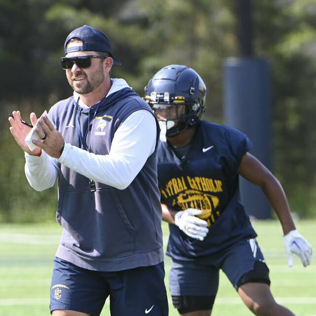 Central Catholic coach Ryan Lehmeier watches practice during the first day of heat week Aug. 5, 2024, in Oakland.