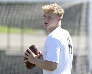Mt. Lebanon quarterback Patrick Smith throws during the Willie Thrower quarterback camp in June at Valley High School.