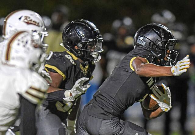 Imani Christian Academy’s Gabriel Jenkins (1) searches for room to run against Highlands last season.