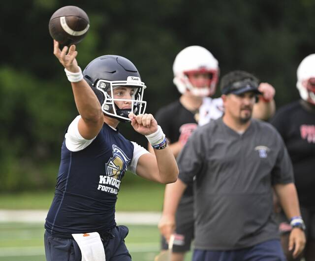 Knoch quarterback Max Wiley throws during a 7-on-7 tournament at Fox Chapel.