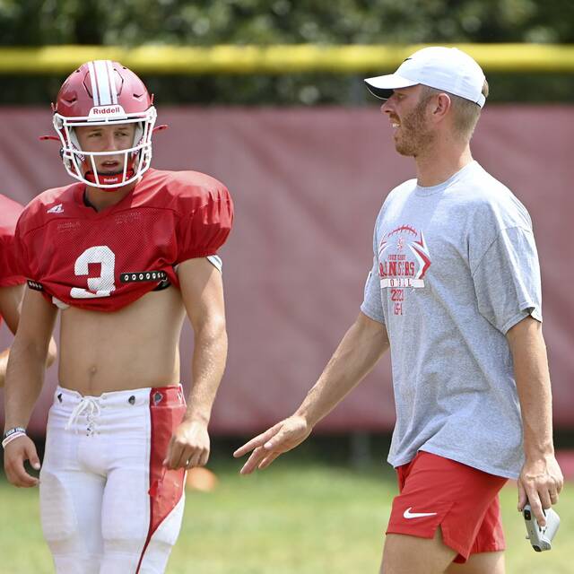 Fort Cherry coach Tanner Garry and quarterback Matt Sieg