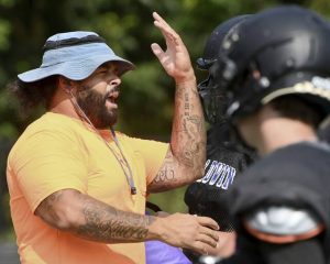Baldwin head coach Dana Brown works with his team during practice on Tuesday, Aug. 5, 2025, at Highlanders Stadium in Baldwin.