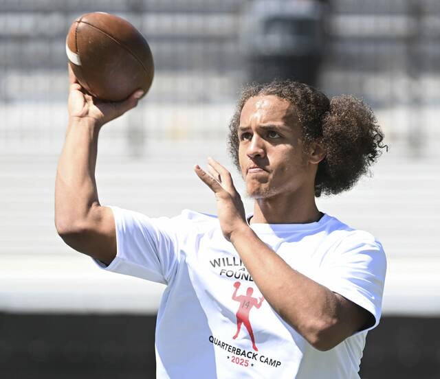 Northgate quarterback Devontae Smith throws during the Willie Thrower quarterback camp in June at Valley High School.