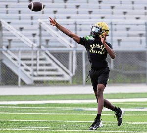 Valley quarterback Brendon Knuckles throws during the WCCA 7-on-7 tournament July 17 at Hempfield.