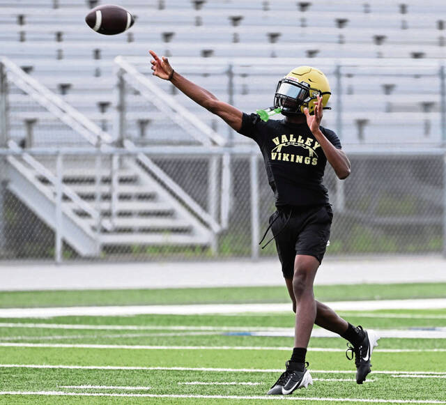 Valley quarterback Brendon Knuckles throws during the WCCA 7-on-7 tournament July 17 at Hempfield.