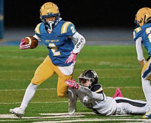 West Mifflin’s Armand Hill avoids Knoch’s Wyatt Fraser during a game last October. Hill rushed for more than 1,600 yards last season and scored 23 touchdowns.