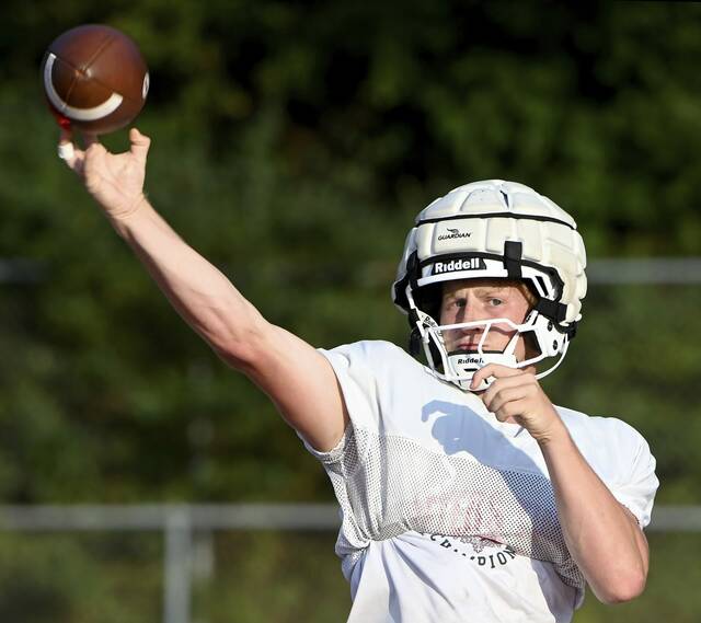 Peters Township quarterback Nolan DiLucia throws a pass during practice on Wednesday, Aug. 6, 2025, at Peters.