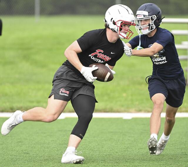 Fox Chapel’s Max Melocchi pulls in a catch against Knoch during a 7-on-7 tournament July 9, 2025 at Fox Chapel Area High School.