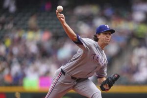 Texas Rangers starting pitcher Jacob deGrom throws against the Seattle Mariners during the first inning Sunday, Aug. 3, 2025, in Seattle.