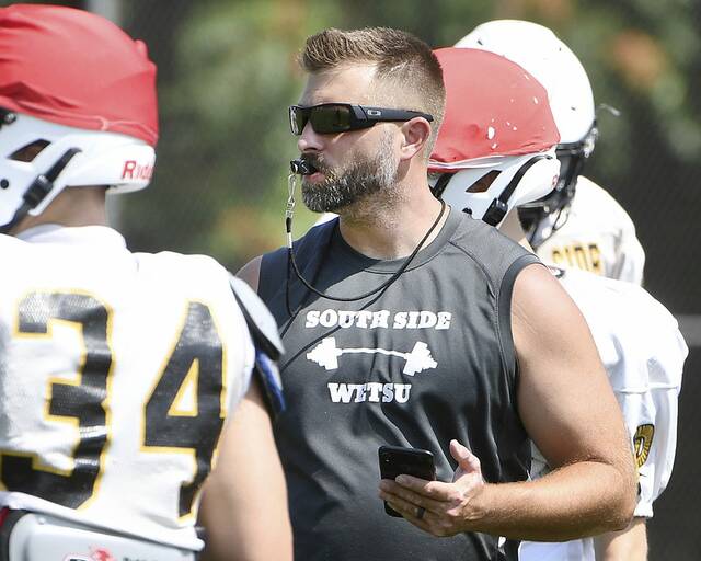 South Side head coach Luke Travelpiece.