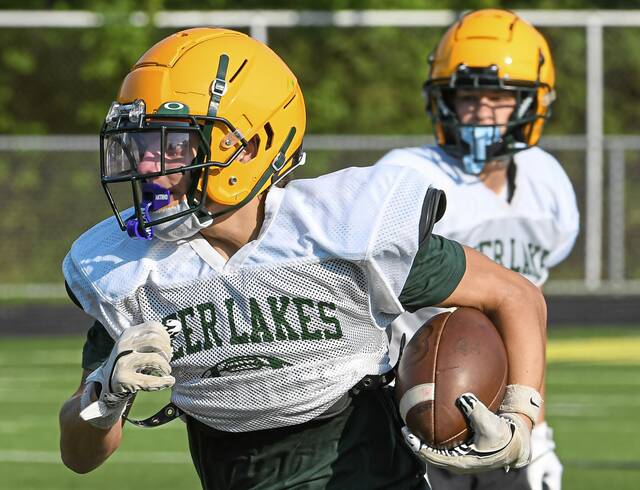 Deer Lakes running back Roman Smith bursts into the open field during practice Wednesday, Aug. 6, 2025, at Deer Lakes High School.
