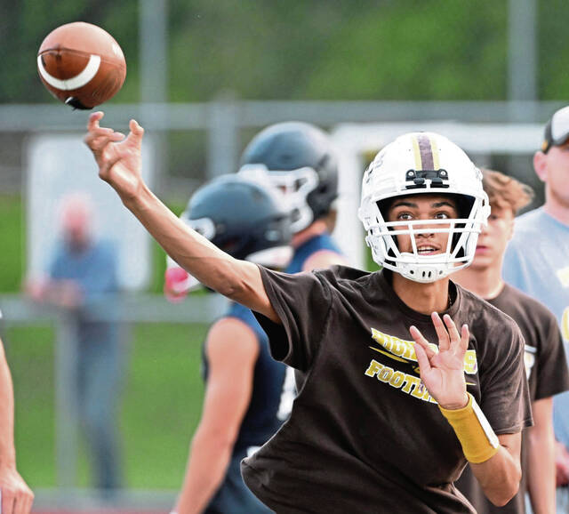 Highlands quarterback Jamarkus Prager throws during 7-on-7 play in July at Fox Chapel.