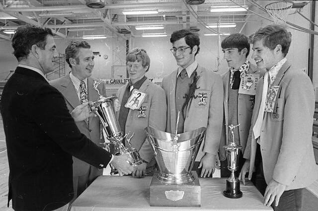 Kiski Area added to its collection of coal buckets, symbolic of winning its fourth consecutive Foothills Conference title with a 36-6 win at Greensburg Salem on Nov. 3, 1972. Coach Dick Dilts admires the hardware along with principal William Miller, Russ Clark, Joe Stone, Larry Gibson and Joe Bushovsky.