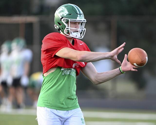 South Fayette quarterback Drew Welhorsky takes a snap during practice on Wednesday, Aug. 6, 2025, at South Fayette.