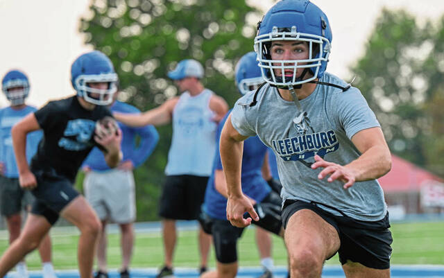 Leechburg running back Tim Andrasy runs through drills at practice Aug. 7, 2025, in Leechburg.