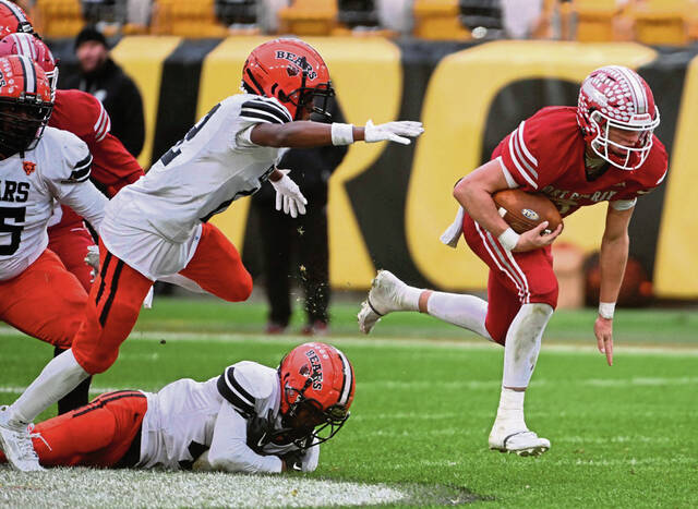 Fort Cherry’s Matt Sieg avoids the tackle attempt by Clairton’s Drahcir Jones during the WPIAL Class A championship game Nov. 23, 2024 at Acrisure Stadium.