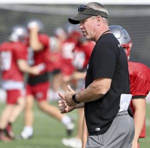 West Allegheny head coach Dave Schoppe works with his team at DeMichela Stadium in North Fayette.
