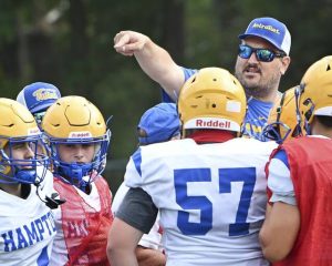 Hampton head coach Steve Sciullo works with his team during practice on Friday, Aug. 8, 2025, at Talbots Stadium in Hampton.