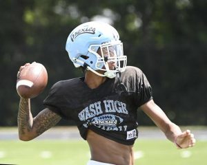 Washington quarterback Tristan Reed throws a pass during practice on Thursday, Aug. 14, 2025, in Washington.