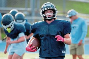 Burrell running back Trey Coury finishes a drill during practice on Thursday, Aug. 7, 2025, at Burrell High School.