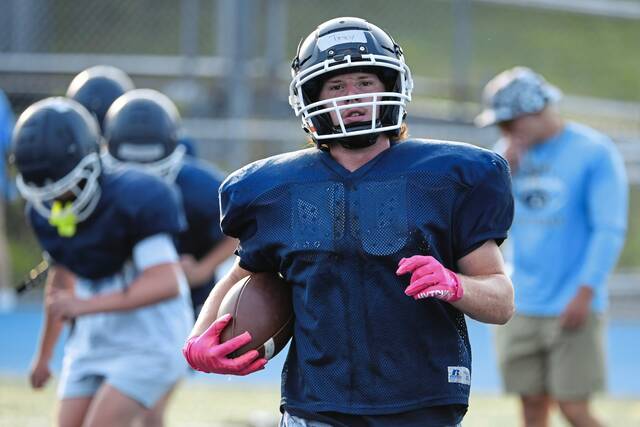 Burrell running back Trey Coury finishes a drill during practice on Thursday, Aug. 7, 2025, at Burrell High School.