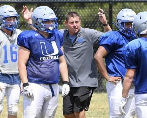 Union coach Kim Niedbala works with his team during practice on Wednesday, Aug. 13, 2025, at Union.