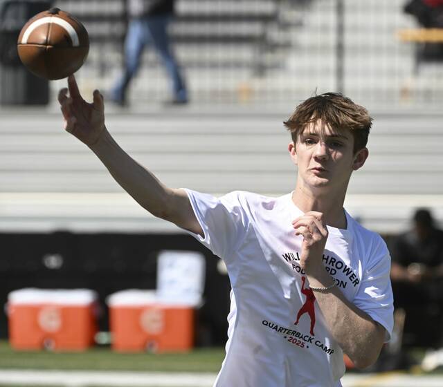 Freeport quarterback Drew Ross throws during the Willie Thrower quarterback camp in June at Valley High School.