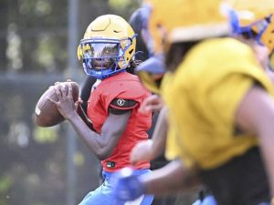 Westinghouse quarterback Zahir Ismaeli looks to throw during practice Wednesday.