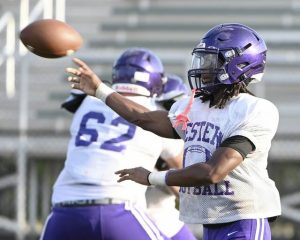 Western Beaver quarterback Amari Marshall throws a pass during practice on Monday, Aug. 11, 2025, at Wright Field in Chippewa.