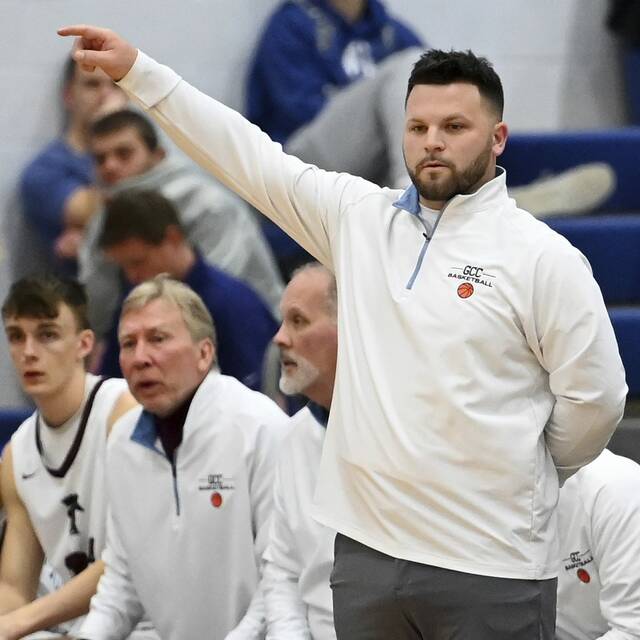 Greensburg Central head coach Christian Hyland watches from the bench during the Centurions’ game against Kiski Area on Dec. 21, 2024, at Hempfield.
