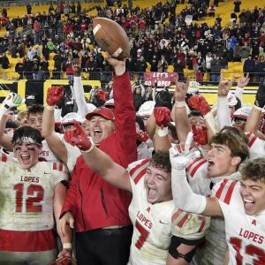 Avonworth coach Duke Joncour celebrates with his team after defeating Central Valley in the WPIAL Class 3A championship game Nov. 23, 2024, at Acrisure Stadium.