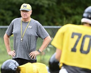 Mapletown head coach George Messich watches practice.