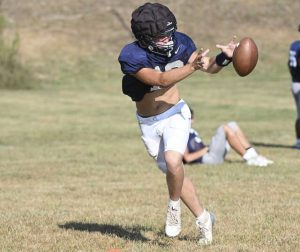 Burgettstown running back Colton County goes through drills during practice Tuesday.