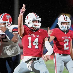 Peters Township’s Reston Lehman celebrates a turnover during the fourth quarter against McKeesport on Friday, Aug. 30, 2024, at Peters.