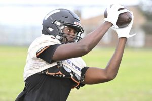 University Prep’s Micah Saunders makes a catch during practice Wednesday.