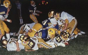 Highlands running back Phil Hayden (31) scored on a 1-yard plunge behind a block from Brian Rigatti (48) against Plum on Aug. 30, 1985 at Mustangs Stadium. Hayden’s two scores were not enough, however, as Plum came back for a 27-12 victory.