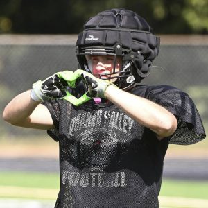 Quaker Valley’s Logan Benedict works out during practice Aug. 11 at Chuck Knox Stadium in Leetsdale.