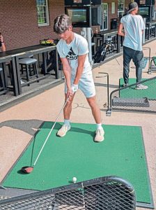 Gateway's Ryan Deselich hits during a practice Aug. 20, 2025, at McDains driving range in Monroeville