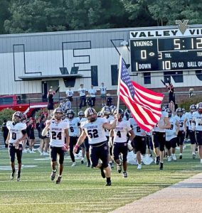 Southmoreland players take the field before their game against Valley on Friday.
