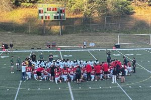 Players from Seton LaSalle and North Catholic gather before their game Aug. 22, 2025, at J.C. Stone Field in North Park.