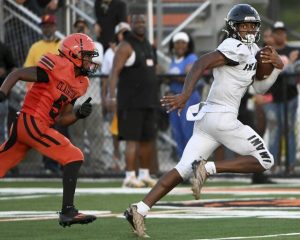Imani Christian’s Gabe Jenkins scores past Clairton’s Taris Wooding during the second quarter on Friday, Aug. 22, 2025, at Tyler Boyd Stadium.