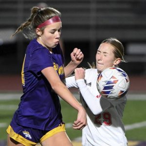 Plum’s Brenna McLaughlin works against Moon’s Riley Lafayette during their WPIAL Class 3A quarterfinal on Thursday, Oct. 24, 2024, at Plum.