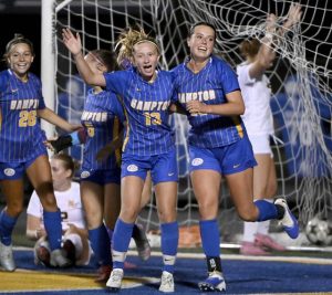 Hampton’s Esme Farmakis (13) celebrates with Harper Gibbons after Gibbons scored during their game against Mars on Wednesday, Aug. 27, 2025, at Fridley Field in Hampton.